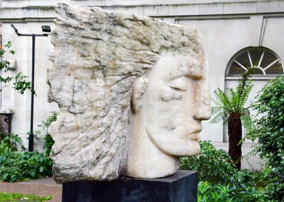Sculpted Stone Head in a Garden of Statues in London near Regents Canal