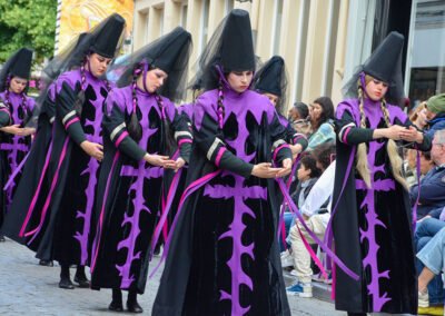 Some of the Beautiful costumes worn in the Bruges Procession of the Holy Blood - Purple Dancers